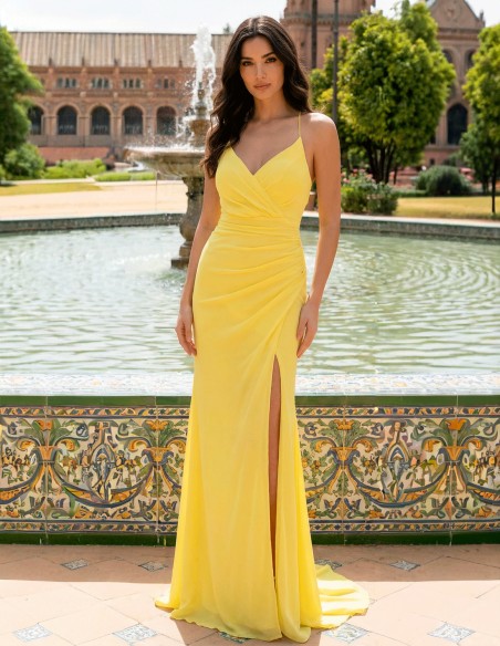 Robe longue de fête jaune pastel avec fines bretelles et dos croisé