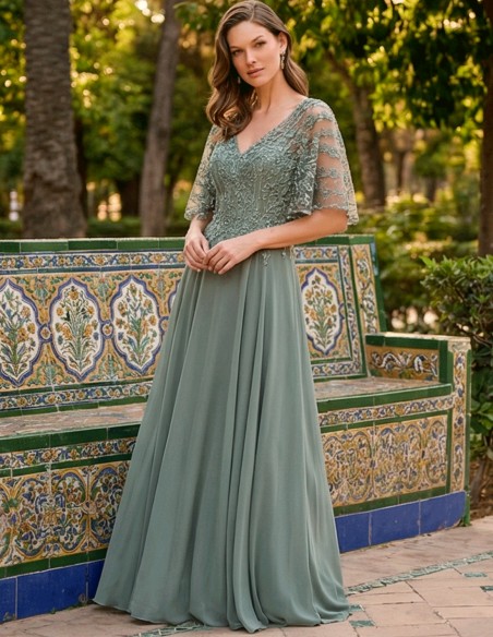 Light green long godmother dress with cape lace bodice