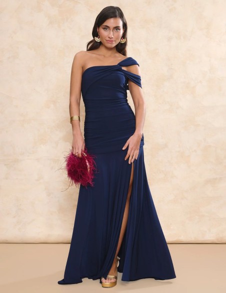 Long blue guest dress with asymmetrical neckline and long cape cut