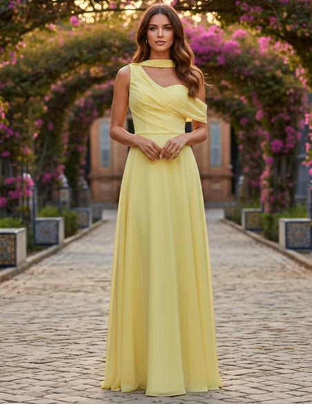 Pastel yellow long gown with asymmetrical neckline and cape sleeves