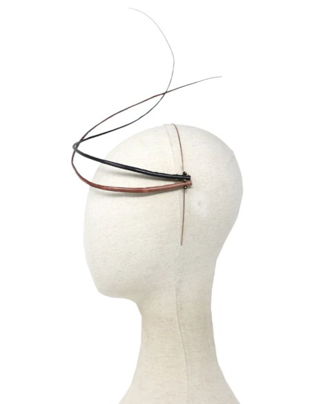 Minimalist headdress with wraparound rachis
