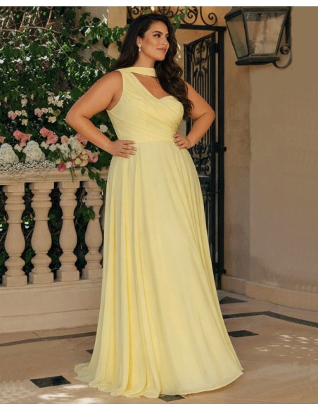 Pastel yellow long gown with asymmetrical neckline and cape sleeves