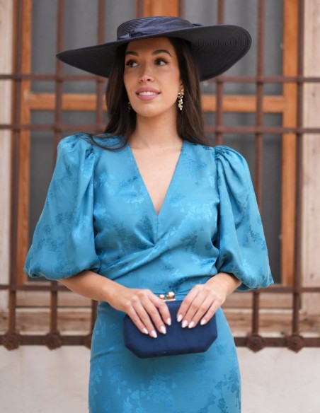 Ensemble deux pièces composé d'un chemisier et d'une jupe en mousseline de soie turquoise