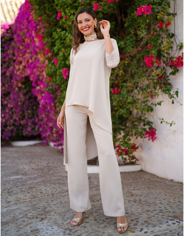 Ivory two-piece set with asymmetrical blouse