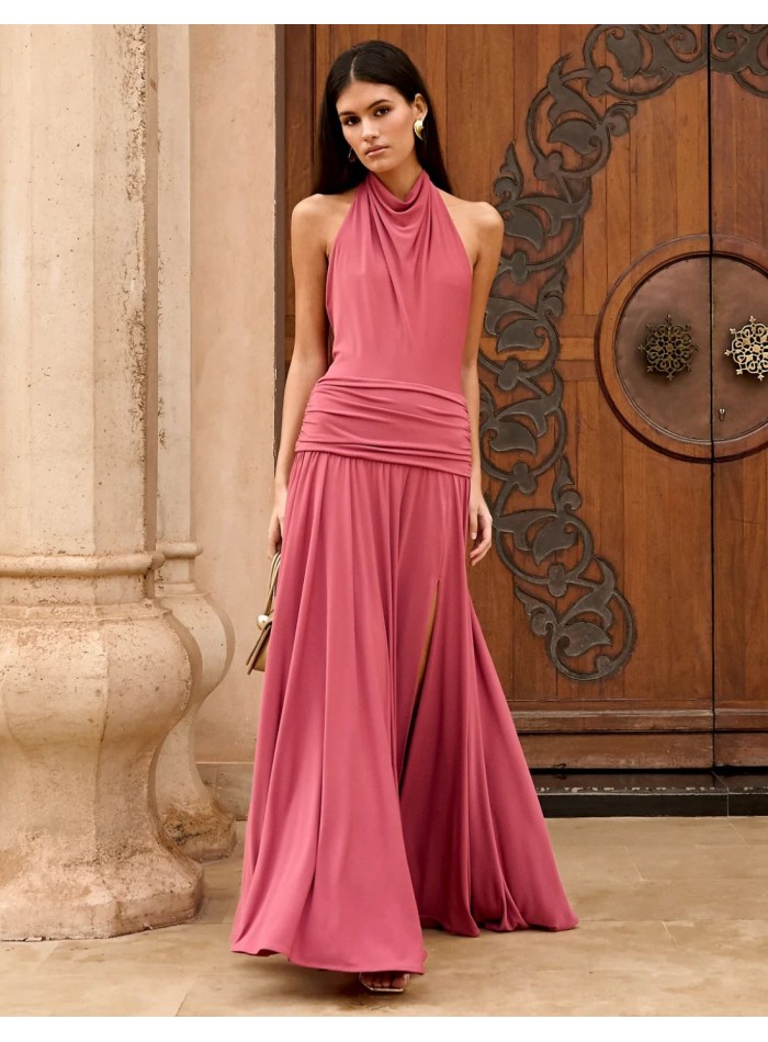 Long pink guest dress with halter neckline and...