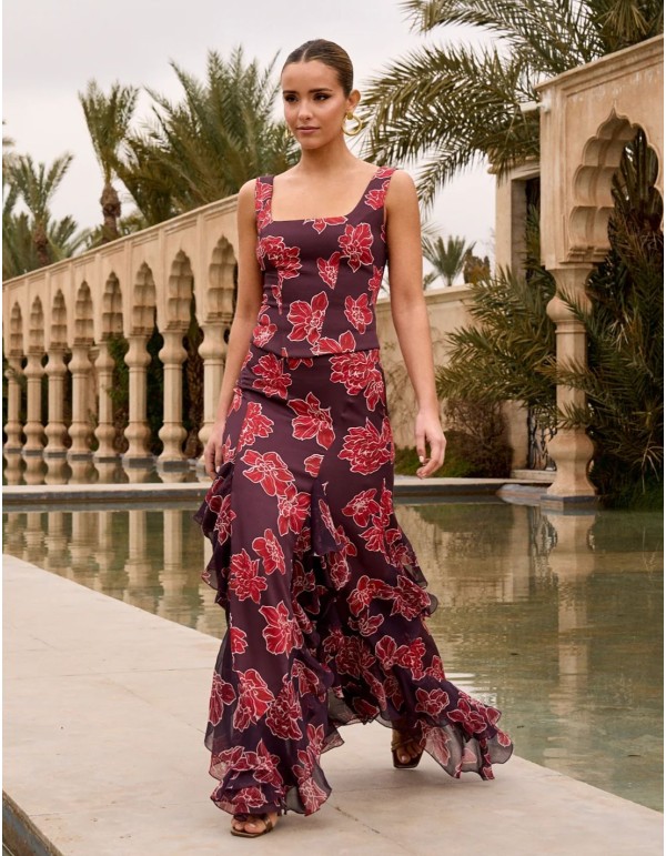 Asymmetrical midi skirt with floral print in eggplant color