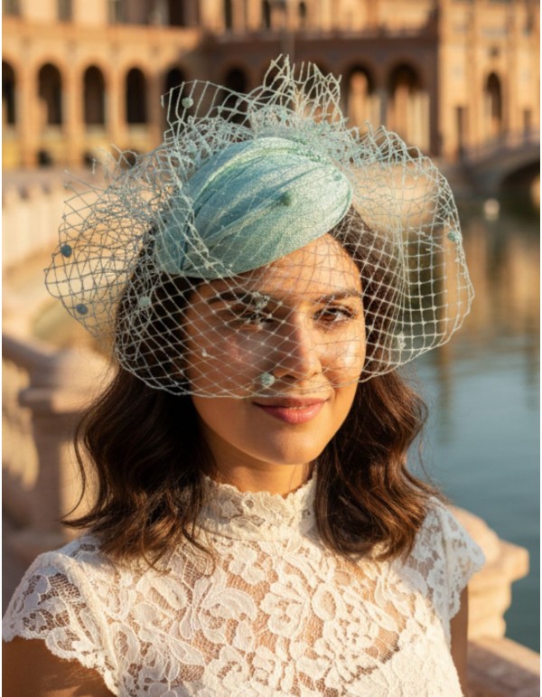 Water green guest headdress with lattice veil