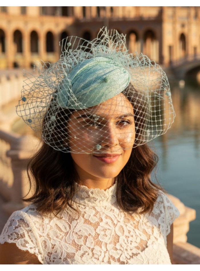 Water green guest headdress with lattice veil