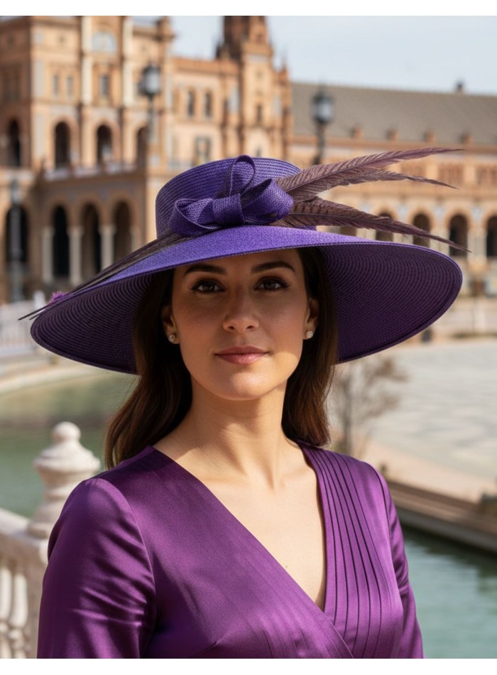 Purple guest pamela with bow and pheasant feathers