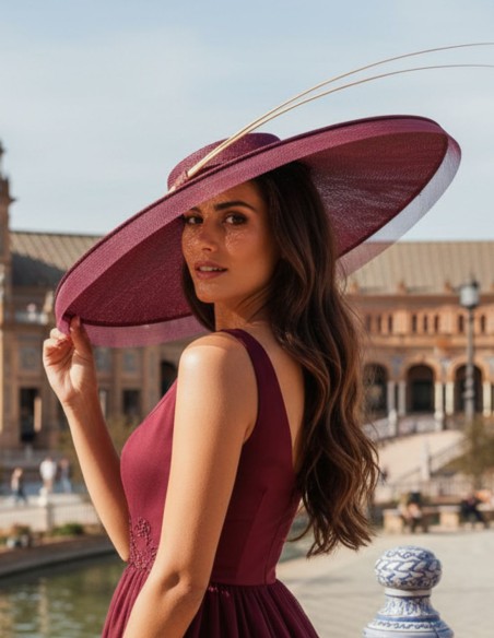 Maroon wedding hat with horsehair detail and handcrafted rachis