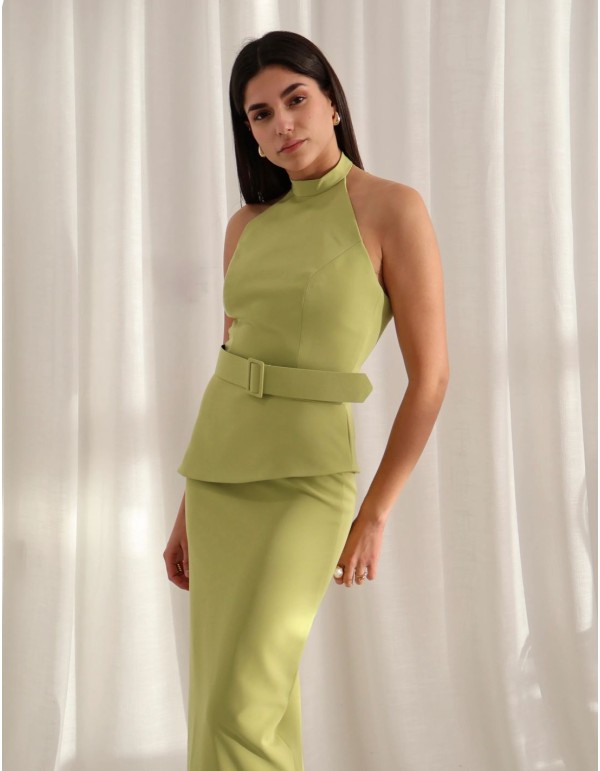 Green two-piece set with halter-neck top and straight skirt