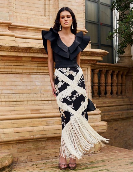 Jupe midi noire avec broderie florale et franges de couleur ivoire