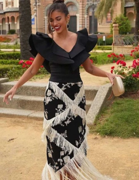 Black midi skirt with floral embroidery and ivory bangs