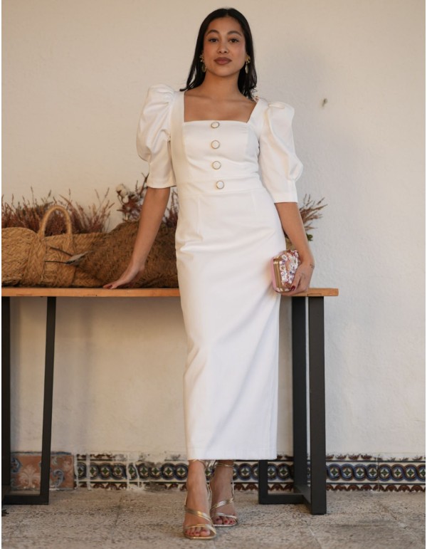 White midi dress made in pique with puffed sleeves