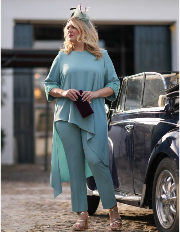 Two-piece set in aqua green with rhinestones on the cuffs