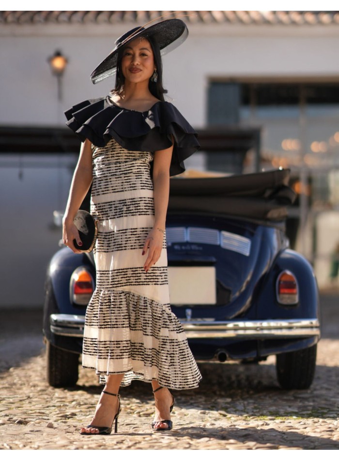 Guest outfit with asymmetrical neckline and...