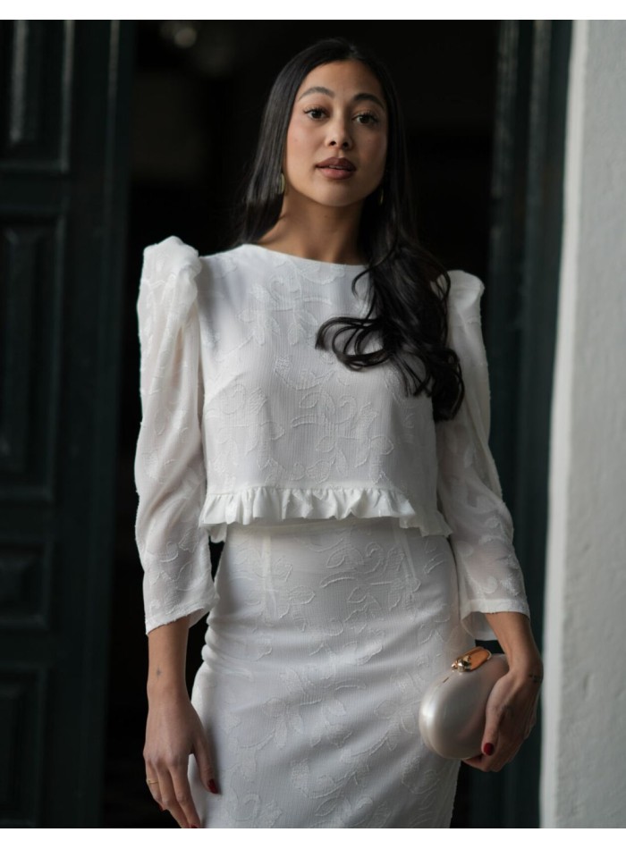 Conjunto blanco de top y falda