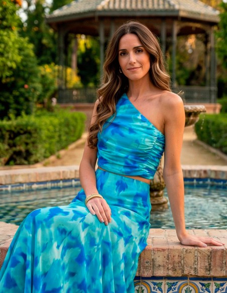 Blue printed chiffon guest ensemble with one shoulder top and midi skirt