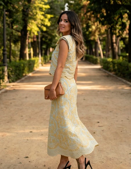 Yellow die-cut set of structured top with shoulder pads and mermaid skirt