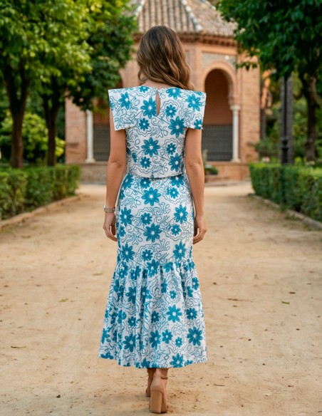 Blue embroidered ensemble with structured top and mermaid midi skirt
