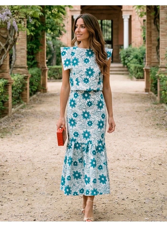 Blue embroidered ensemble with structured top...