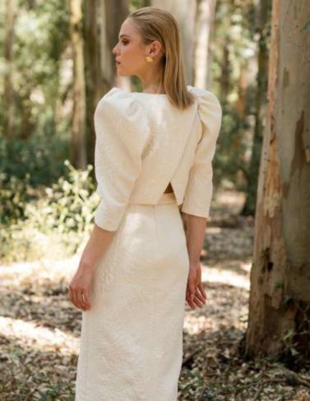 Ensemble deux pièces composé d'une jupe et d'une veste en tweed écru