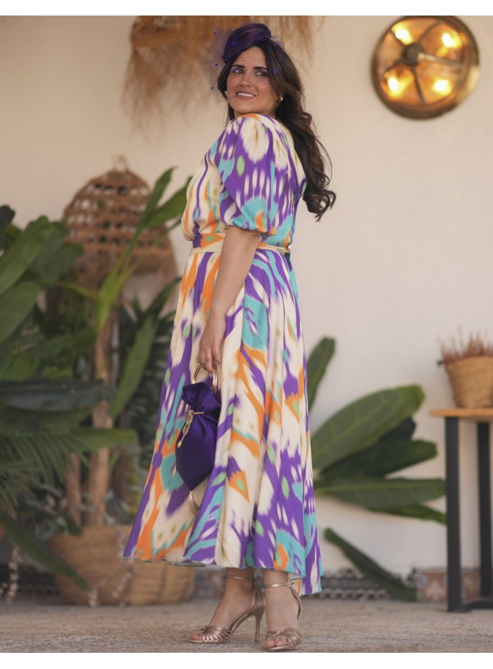 Vestido midi de invitada con tejido fluido estampado para primavera