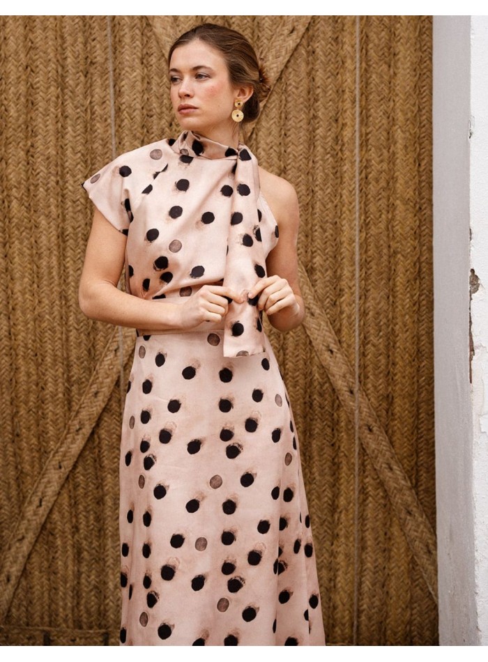 Asymmetrical short sleeve top with polka dot...