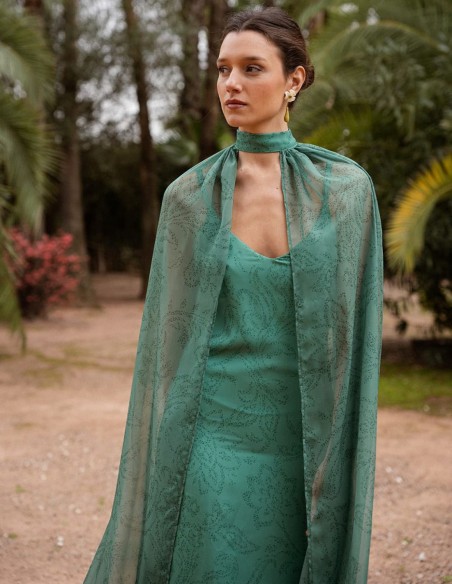 Long emerald green chiffon dress with floral print and cape
