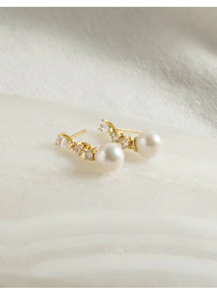 Elegant earrings with three zirconia and pearl...