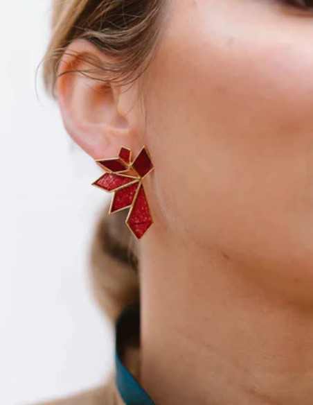 Geometric shape earrings with ruby colored stones