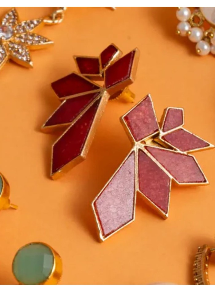 Geometric shape earrings with ruby colored stones