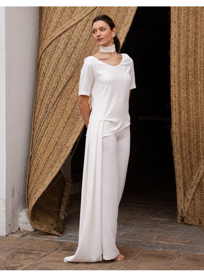 Short sleeve crepe top with asymmetrical cut...