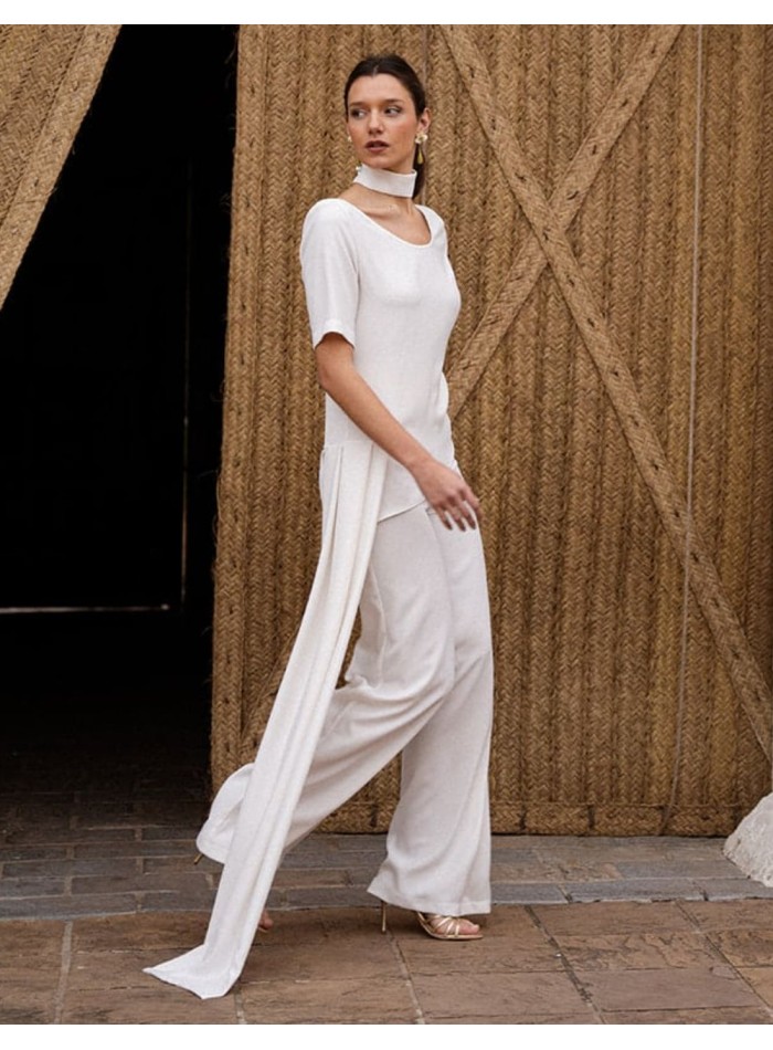 Short sleeve crepe top with asymmetrical cut...