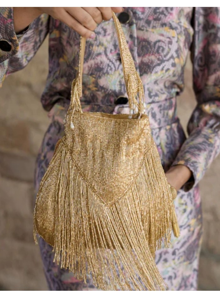 Handmade handbag with bangs in golden color