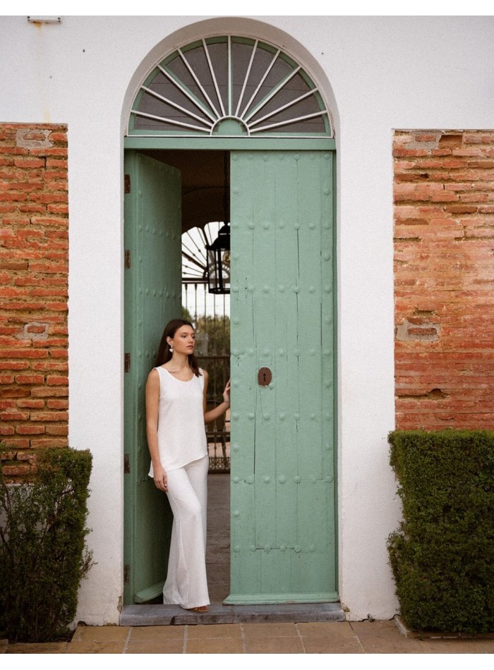 Top asymétrique à bretelles de couleur écru