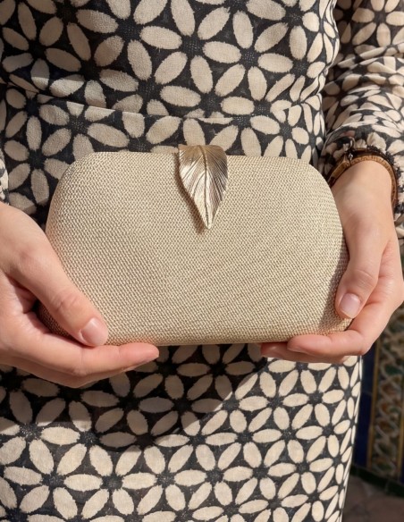 Gold Clutch Bag with Leaf Closure and Elegant Finishing