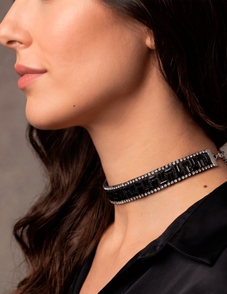 This black crystal rhinestone choker is an elegant piece with character, designed to add sophistication and depth to any look.