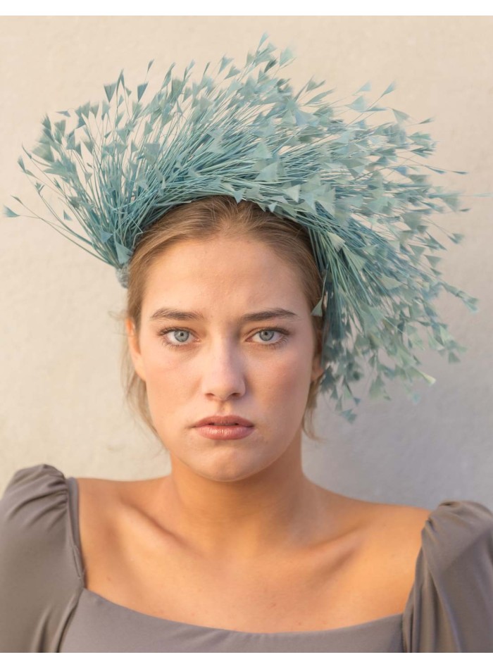 Diadema de plumas naturales azul para invitadas