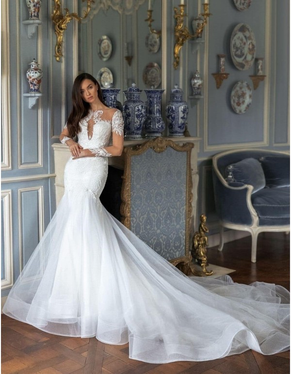 Wedding dress with embroidered tattoo effect sleeves and voluminous tail