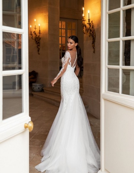 Wedding dress with heart neckline and tattoo effect sleeves from Pollardi
