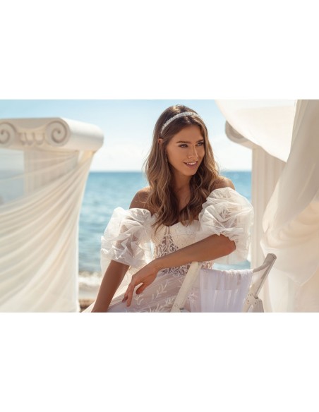 Evasée wedding dress with strapless neckline and open back in beautiful embroidered tulle