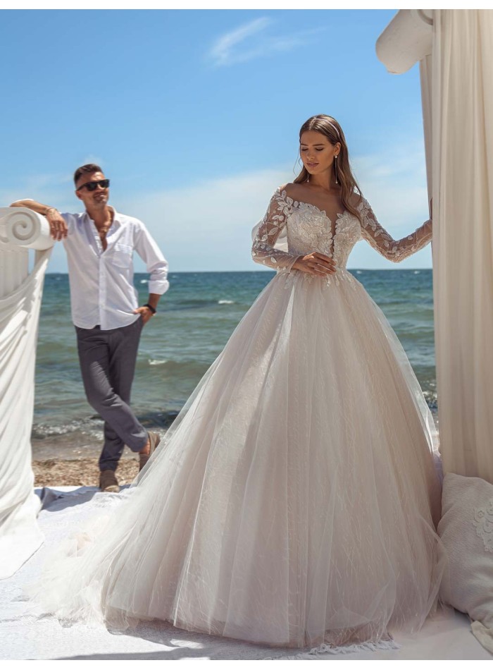 Princess wedding dress with beautiful embroidered bodice and tattoo effect long sleeves at INVITADISIMA