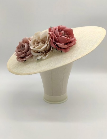 Pamela on sinamay base with pastel coloured flowers