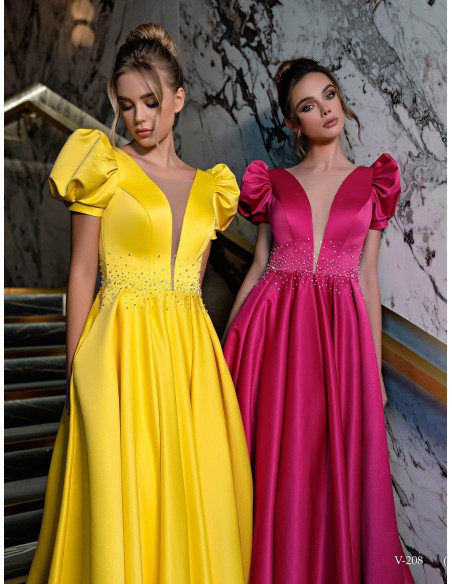 Vestido largo de fiesta con manga farol y escote pronunciado