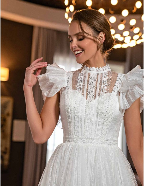 Vestido midi con falda de tul y mangas fantasía