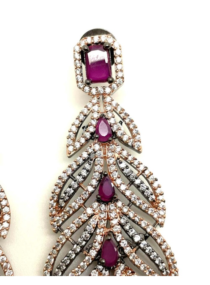 Long evening earrings with leaf shape