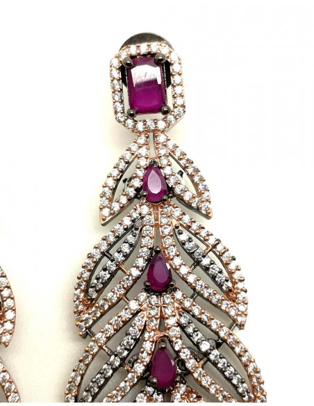 Long evening earrings with leaf shape