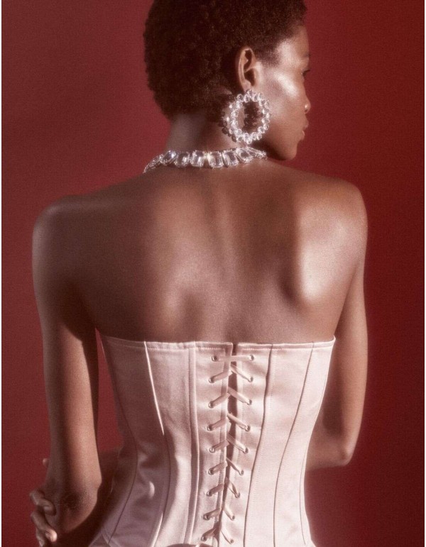 Top de fiesta rosa empolvado con corpiño corazón