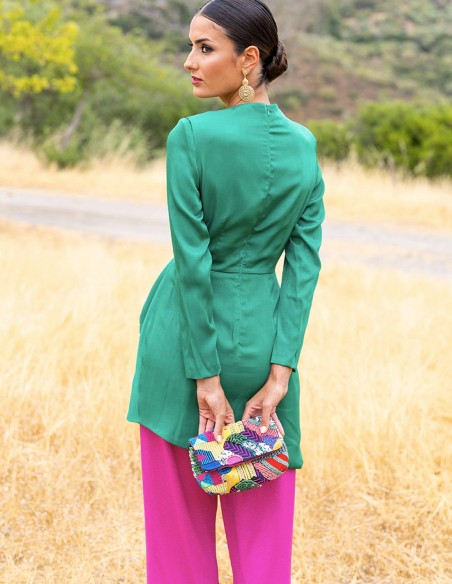 Party outfit with knotted top and bell bottom pants for guests